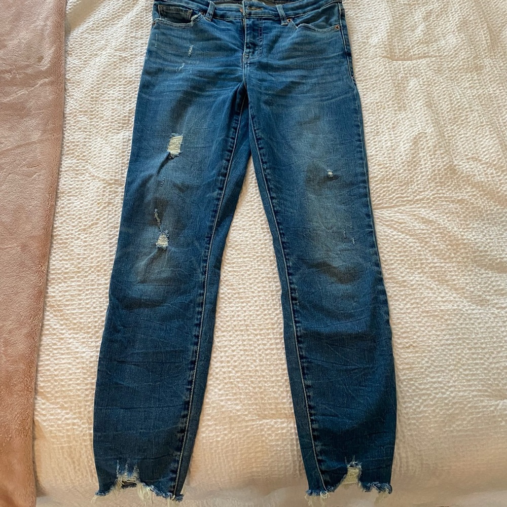 Low Rise Skinny Jeans with distressed bottom